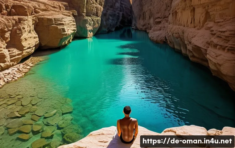 오만의 지정 생태 관광지 - **A tranquil and majestic scene within a hidden wadi in Oman, reminiscent of Wadi Shab.** Crystal-cl...